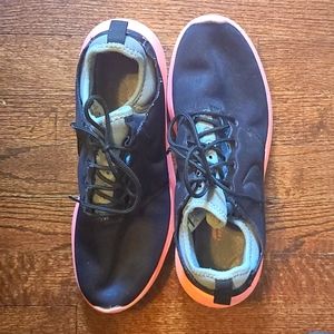 Nike tennis shoes. Love them, but didn't wear them often.